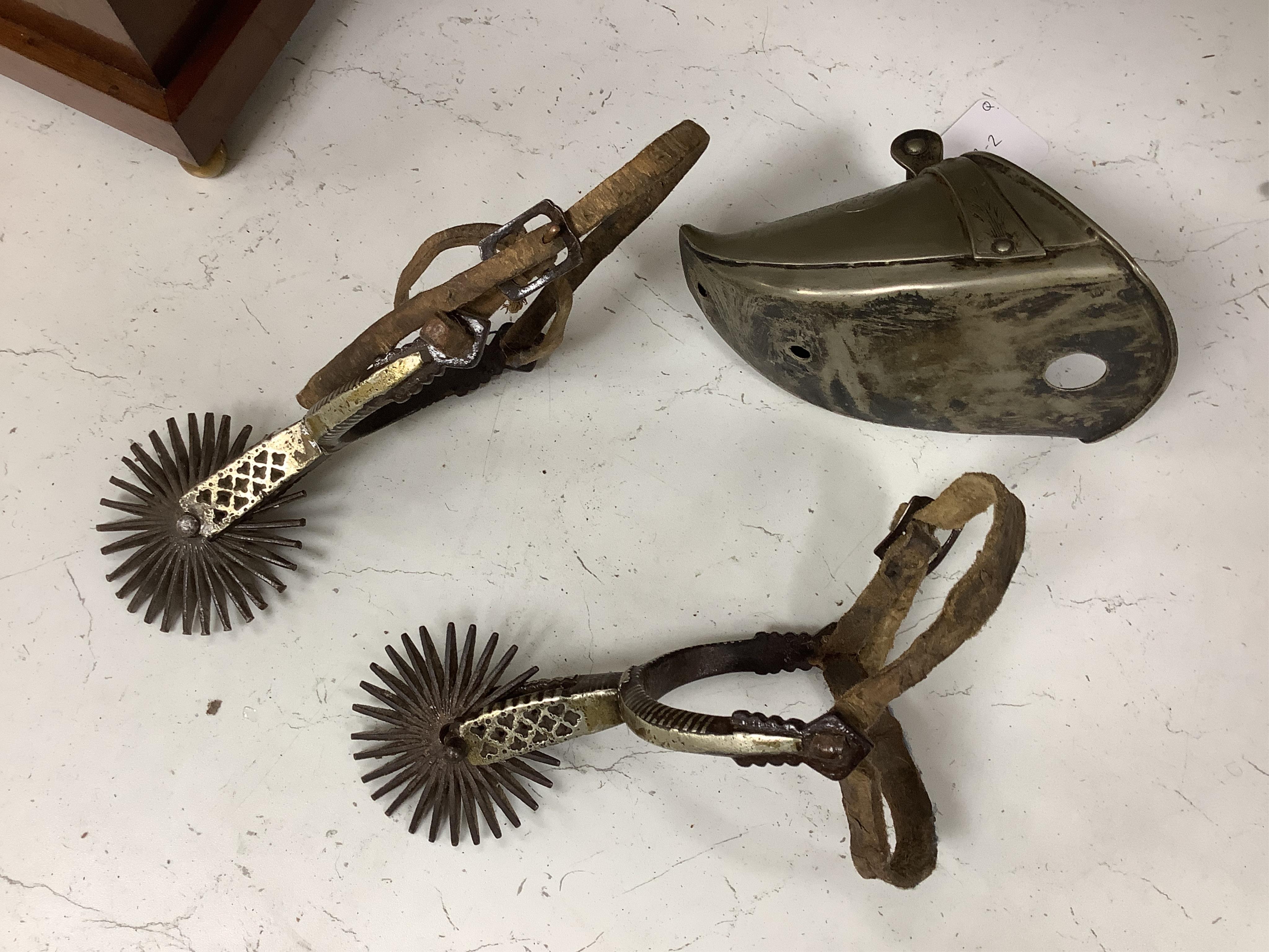 A group of Argentinian Gaucho spurs, bolas, bull whip, daggers and hanger, Longest 100cm